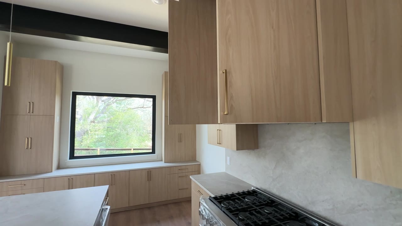 Custom oak kitchen cabinets in a modern Houston home